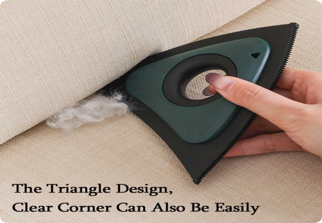 Removing pet hair from a sofa using the Electrostatic Pet Lint Remover